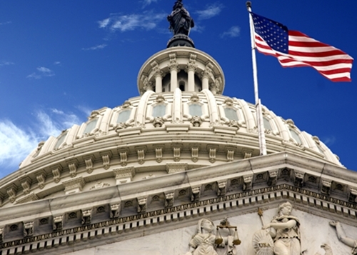 Featured_united_states_capitol_dome_and_flag_29514